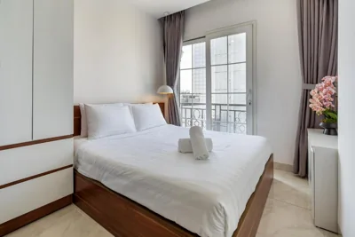 Superior-Dreibettzimmer — Otis Apartment - 33 Trần Kế Xương Rooftop View